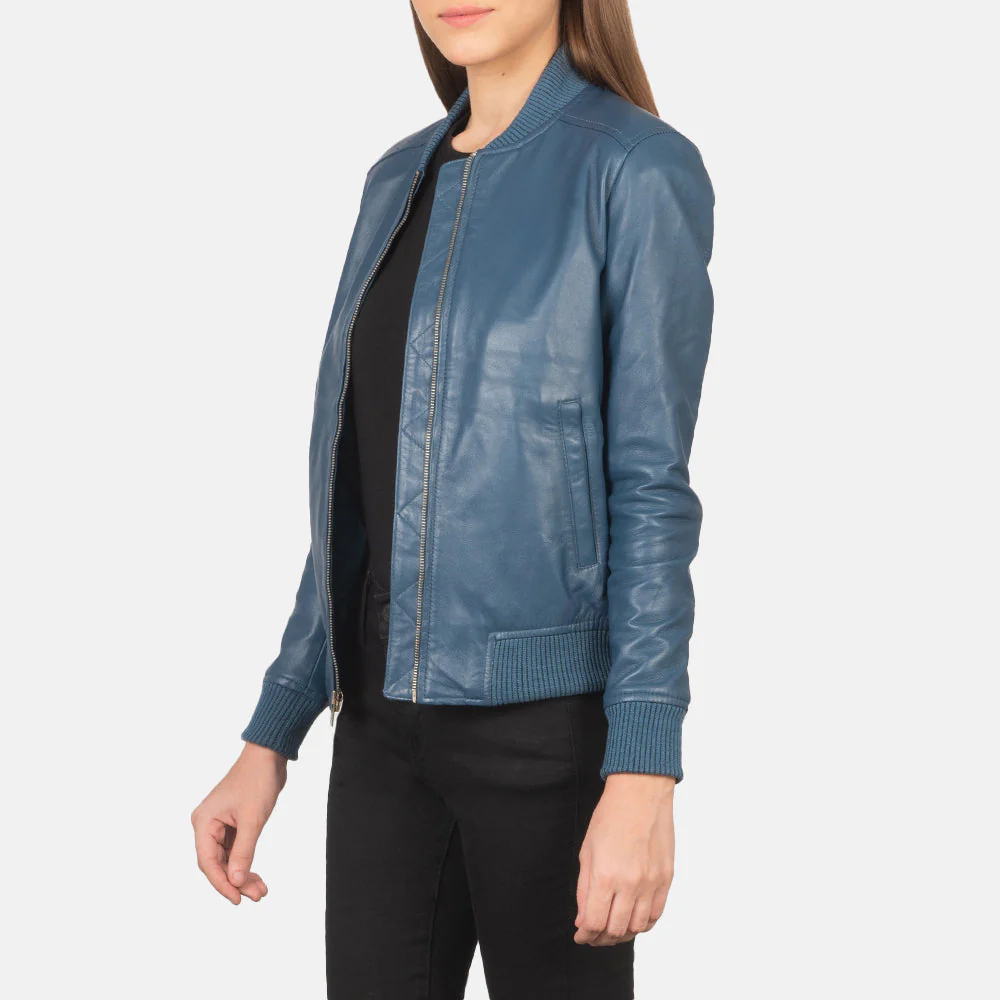 Women_s_Bliss_Blue_Leather_Bomber_Jacket_Side_Pose_33aec98d-fa26-4517-88d2-2c0e95cef2e4