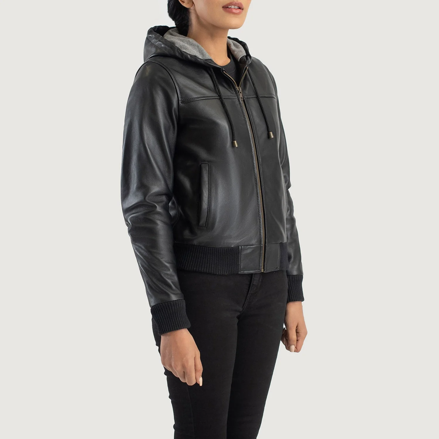 Women_s_Rebella_Black_Hooded_Leather_Bomber_Jacket_Side_Pose-3_4ebbf0a5-22a2-4b21-bbf5-228c6393b63d