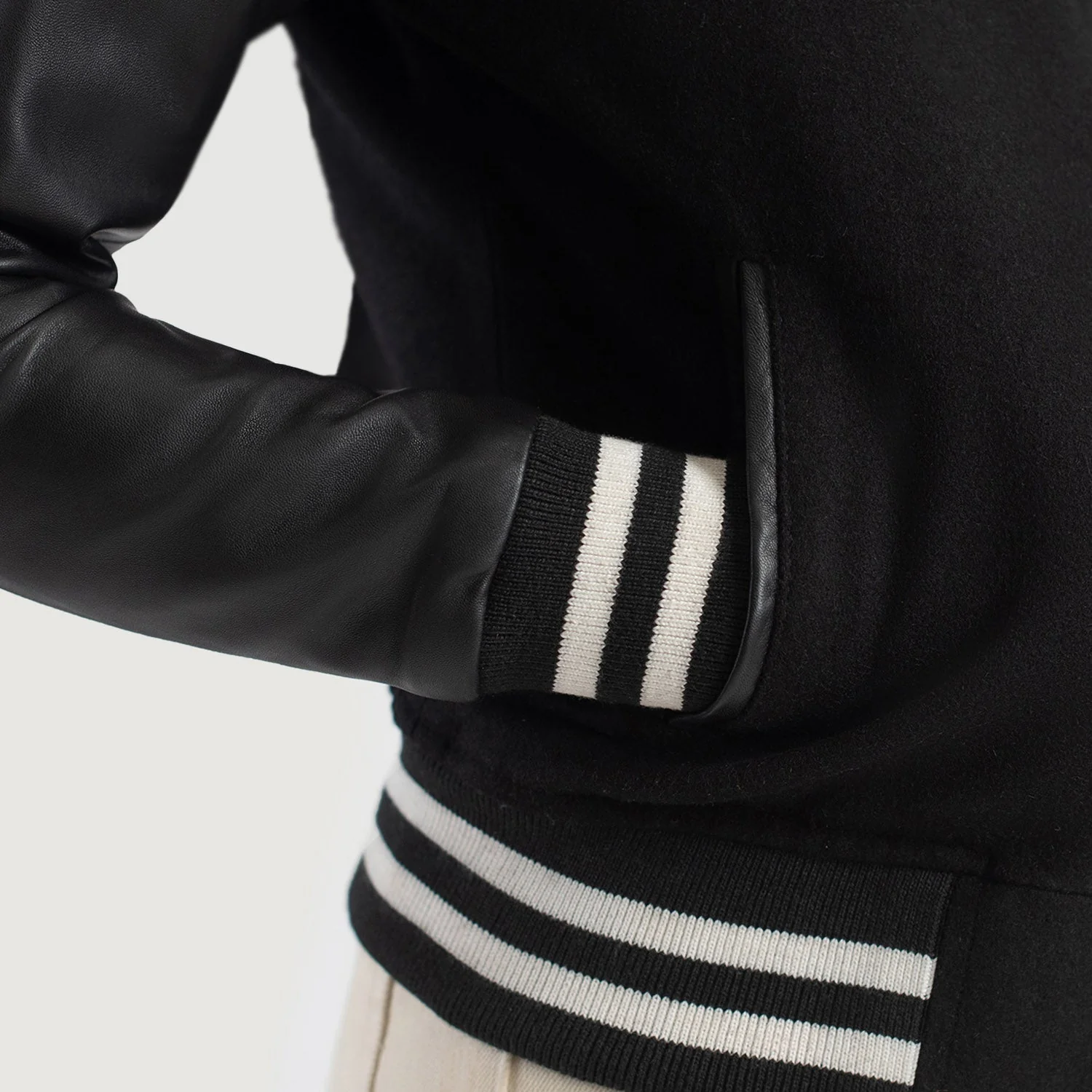 Women_s_Savant_Black_Hybrid_Varsity_Jacket_Close-Up-9_21aa9a0d-53e0-46a9-aaaa-f50f518cade6 (1)